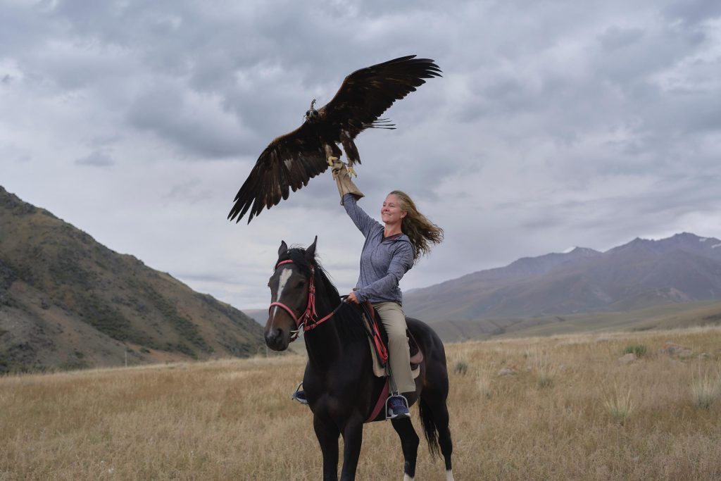 Ali on horseback with a golden eagle